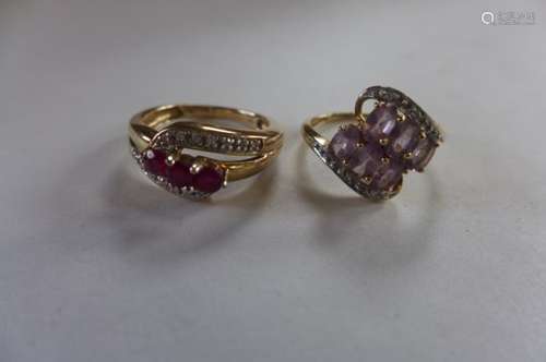 A 9ct gold spinel and diamond ring, size O, and a 9ct ruby trilogy diamond, size M/N, both with