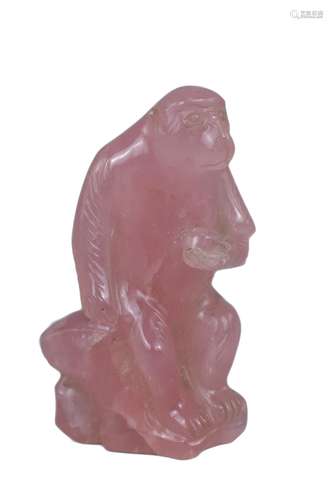 A Chinese rose quartz carved figure of a monkey