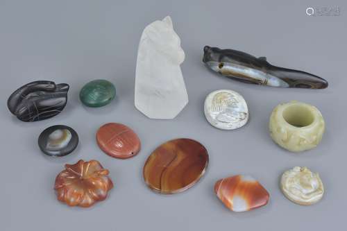 A group of twelve hard stone carvings and objects