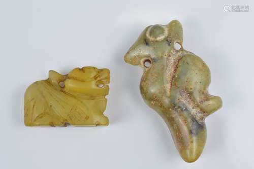 Two Chinese carved jade pendants