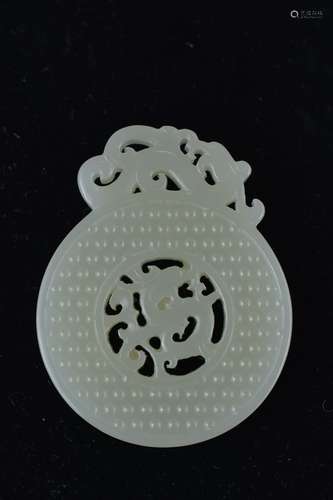 A Chinese white jade Bi Disc dragon pendant