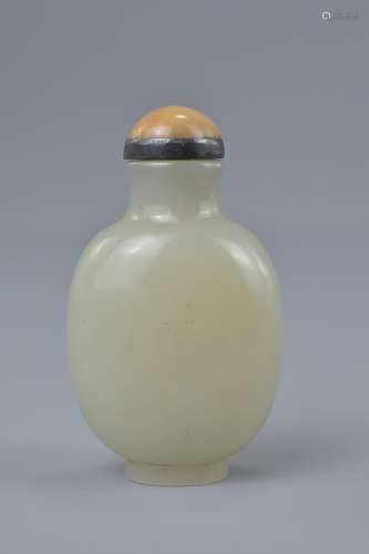 A Chinese 19th century white jade snuff bottle