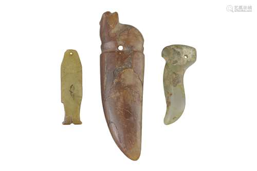 A group of three Chinese Western Han dynasty jade pendants