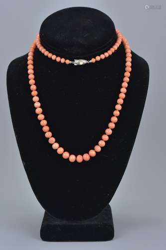 A natural coral graduated beaded necklace