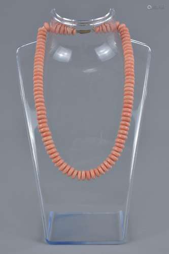 A flat bead coral necklace