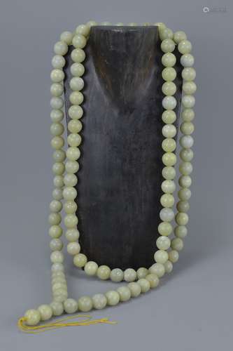 A large jade Chinese Buddhist bead necklace