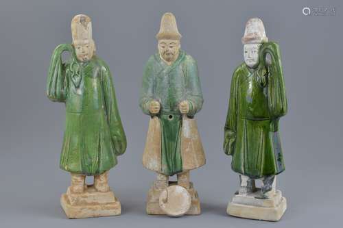 Three Chinese Ming dynasty green glazed figures