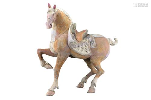 A very large Chinese Tang dynasty painted pottery horse