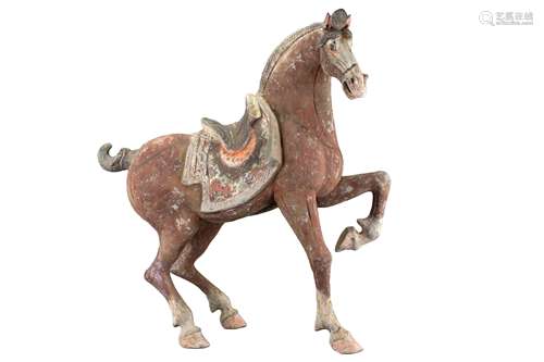 A very large Chinese Tang dynasty painted pottery horse