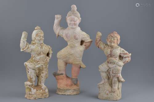 Three Chinese Tang dynasty pottery guardian figure