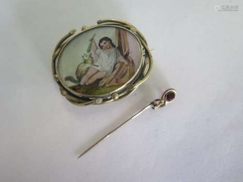 A 19th century decorative brooch, 5cm wide, and a pin