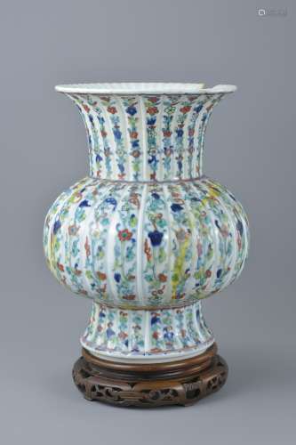 A Chinese doucai porcelain vase on stand