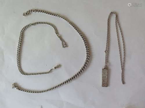 Three silver chains, and an ingot, total weight approx 3.1 troy oz