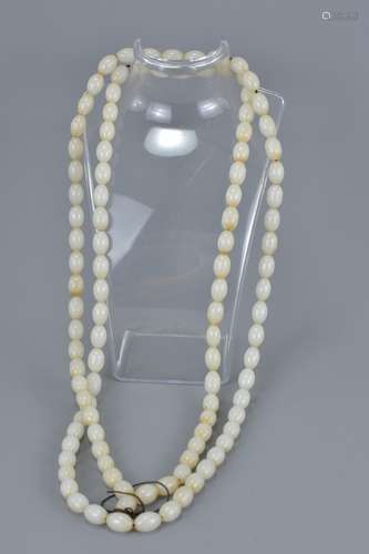 Long String of approximately 108 White Jade Style beads