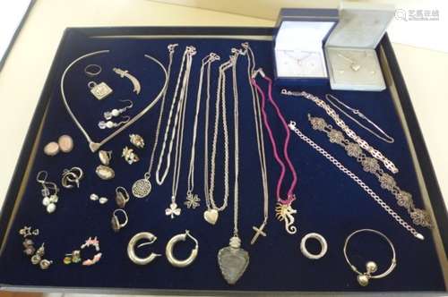 A collection of silver jewellery including necklaces, pendants, bracelets, earrings, a collar - over