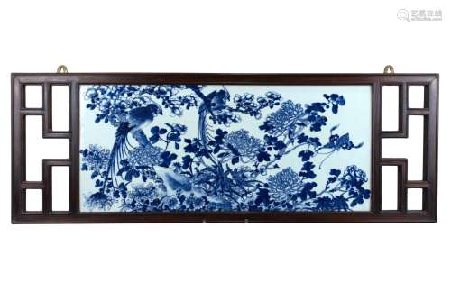 A Chinese 19th century porcelain plaque in hardwood frame