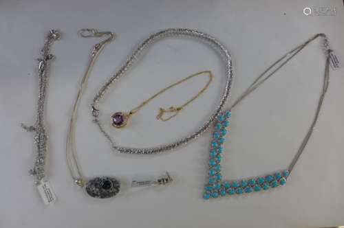 A silver and turquoise necklace, a silver topaz necklace with certificate, a silver amethyst pendant