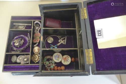 An antique jewellery box and contents, including silver