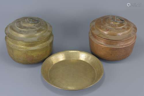 Two large brass metal pots with covers together with one large dish