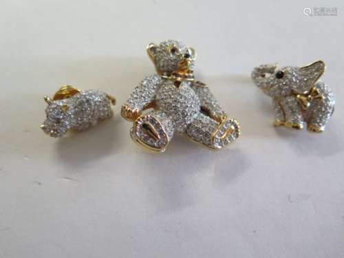 Two Swarovsky crystal brooches of a teddy bear and hippo, and a similar Grosse elephant