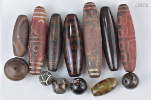 Collection of Nine Tian Zhu / Dzi Style Beads