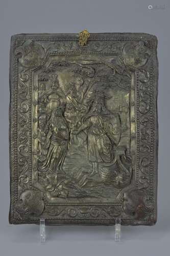 A bronze metal plaque depicting King Arthur