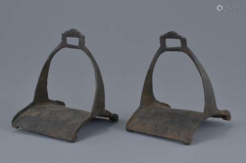 A pair of cast iron horse stirrups