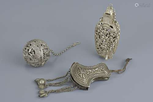 Three white metal items including scent box amulet