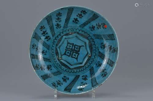 A Middle Eastern turquoise glazed pottery bowl