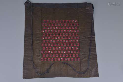 A Chinese Miao embroidered dyed apron