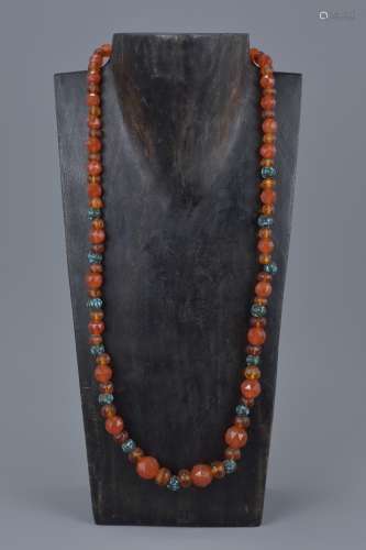 String of Faceted Carnelian Beads