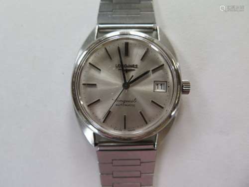 A gents Longines conquest automatic wrsitwatch with a Speidel stainless steel strap, in working