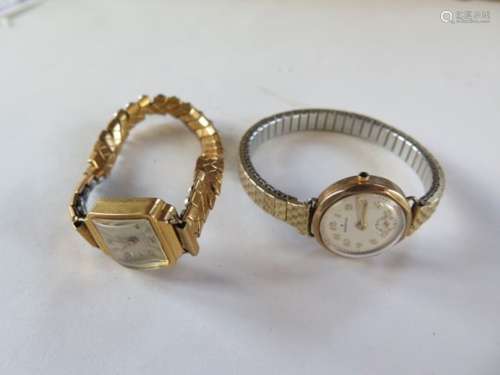 An 18ct ladies wristwatch, with plated strap, approx 14 grams, running - and a 9ct ladies watch on