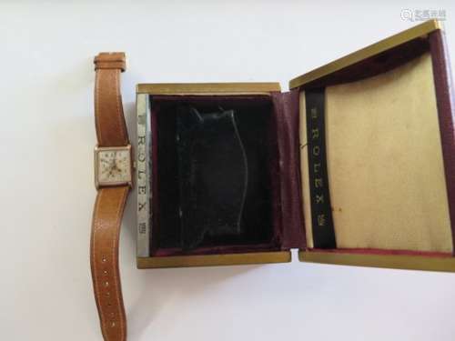 A Rolex 9ct light rose gold tank watch, circa 1920's, Arabic numerals to rectangular dial and