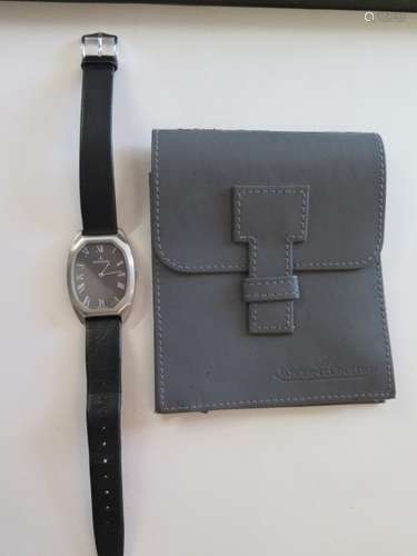 A fine gents Jaeger Le Coultre steel wrist watch, coffin shape case, with black dial and roman