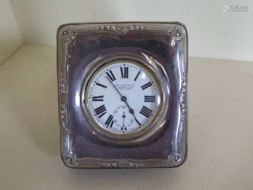 A Goliath size Doxa 6.5cm pocket watch, city Jewellery Co, in a silver fronted travel case, watch