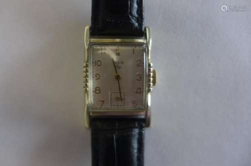 An Elgin 17 jewel manual wind gents wristwatch circa 19950 - 26mm wide including button, in good