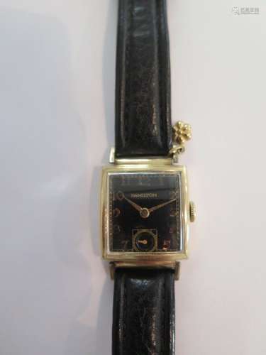 A gents black faced Hamilton wristwatch, the case no H598853 - marked 14K gold filled, the