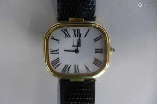 A silver gilt gents Dunhill quartz wristwatch in good condition with new battery, 35mm wide