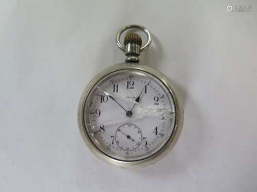 An Omega pocket watch, not working, broken glass