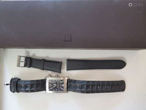 A gents steel cased Dunhill Automatic wrist watch, the chunky rectangular case with crown and