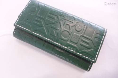 A Rolex green leather key wallet, embossed case, with Rolex name repeated design, stamped Rolex