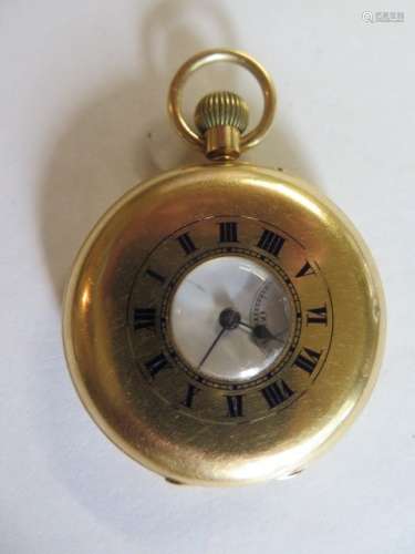 An 18ct gold cased half hunter pocket watch, the case hallmarked London 1912 - top wind movement,