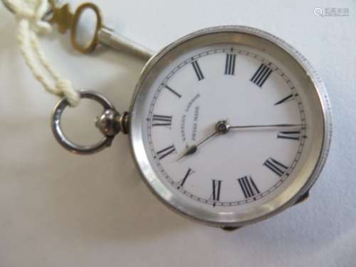 A ladies silver fob watch by J B Yabsley of London, white enamel face with Roman numerals, case