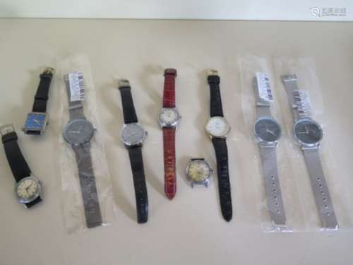 A collection of nine watches, four Quartz and five mechanical, working in the saleroom