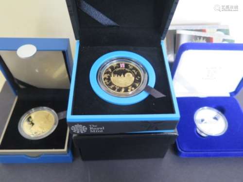 Three cased mint silver crowns, two of which are gilded, including - gilded 2012 £5 crown, Diamond