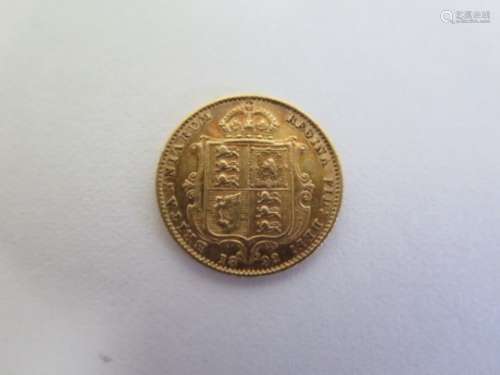 A Victorian shield back gold half sovereign, dated 1892