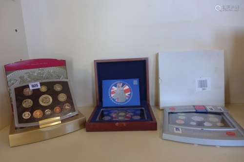 A 2000 GB deluxe proof collection, 2003 GB executive proof set and a 2004 GB executive proof set