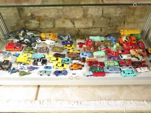 A collection of Disney Pixar and other toy cars, and vehicles, play worn condition