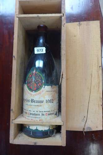 A 150cl bottle of Chorey-Les-Beaune 1982 red wine, in wooden case, level looks good